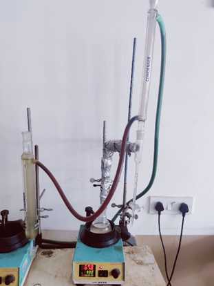 Refluxing using Dean-Stark apparatus and reflux condenser Refluxing using Dean-Stark apparatus and reflux condenser