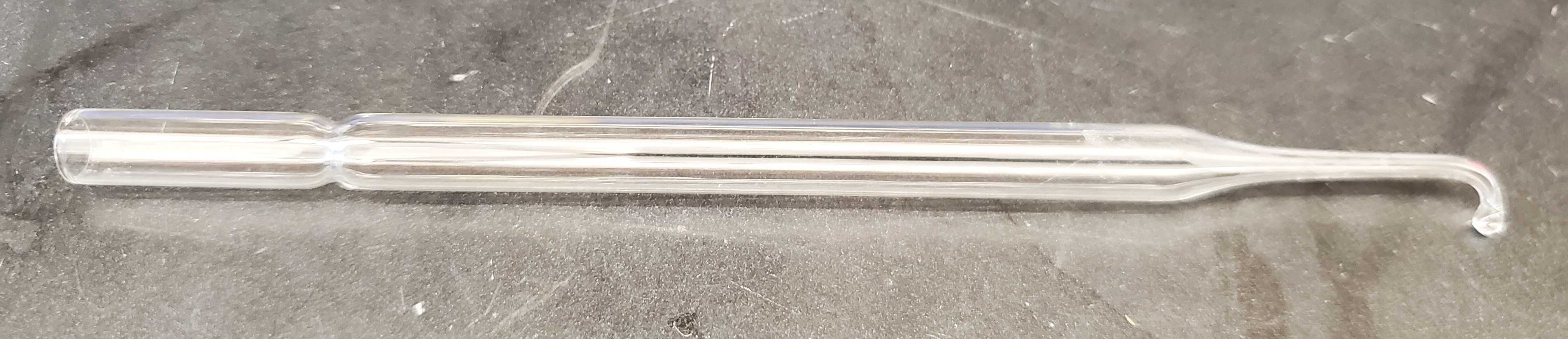Figure 2: Example of a borosilicate glass Pasteur pipette that has been sealed and shaped into a hook using a Bunsen burner flame. This pipette is used to transfer free-floating mouse brain sections between wells. Figure 2: Example of a borosilicate glass Pasteur pipette that has been sealed and shaped into a hook using a Bunsen burner flame. This pipette is used to transfer free-floating mouse brain sections between wells.