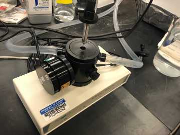 Electrode chamber with electrode disc fastened in place and light sensor being inserted to the chamber. Electrode chamber with electrode disc fastened in place and light sensor being inserted to the chamber.