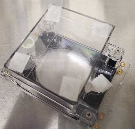 Fig. 10: Micropore tape covering the chamber vents and the sampling port Fig. 10: Micropore tape covering the chamber vents and the sampling port